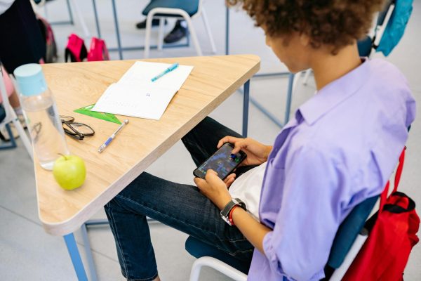 Distractions in Class: How Phone Dependent Societies Affect Students Worldwide